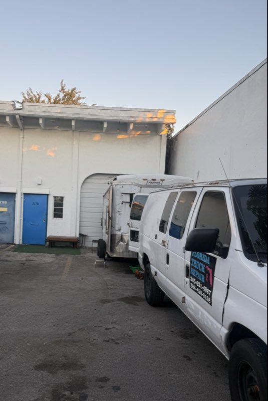 Florida Truck Repair mobile service van and trailer at the shop