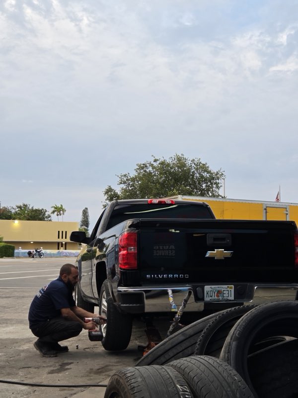 Roadside tire change on a pickup truck